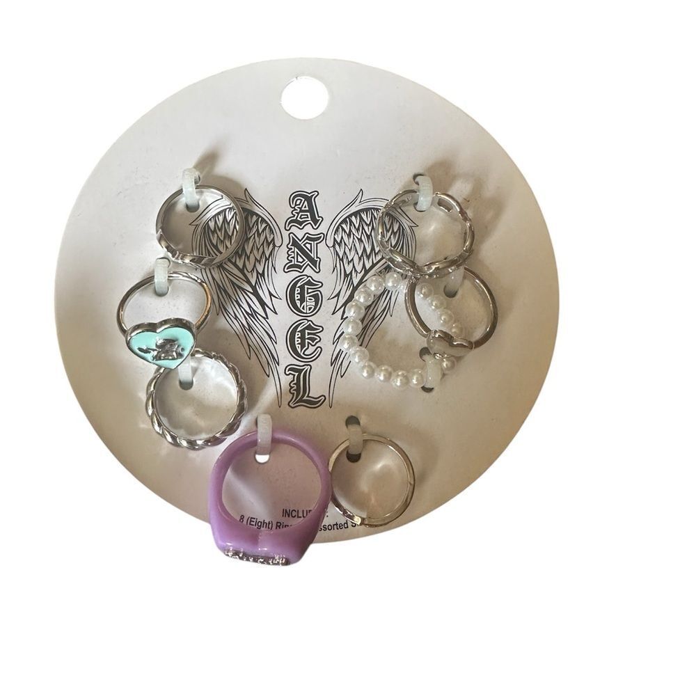 Fashion Rings set of 7 silver tone.